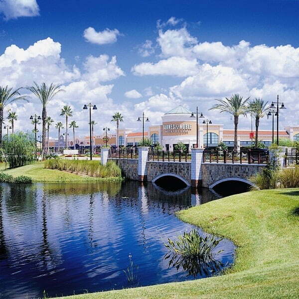 Waterford Lakes exterior view of Affinity's location with palm trees on a sunny day in Orlando, Florida.